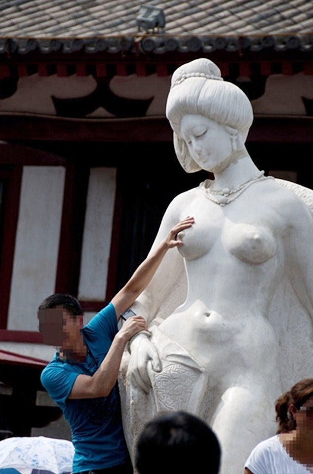 People Refuse To Stop Grabbing This Chinese Statue's Tits
