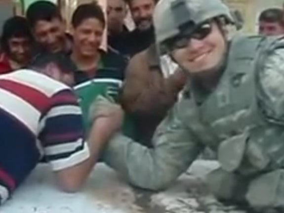 An Army Soldier Goes Up Against An Iraqi Guy In Arm Wrestling, Completely Embarrasses Him Multiple Times In A Row