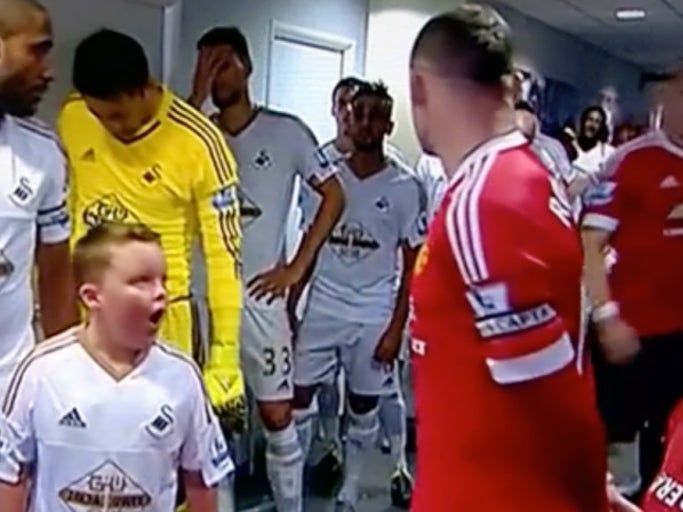 This Little Kid's Head Almost Exploded When He Realized He Was Standing Next To Wayne Rooney