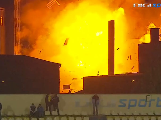 Super Casual Building Explosion In The Background Of A Soccer Game
