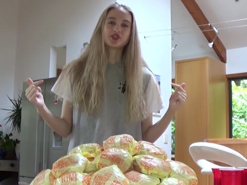 Our Favorite Competitve Eater Chick Nela Zisser Ends The Year By Trying To Eat 100 Cheeseburgers