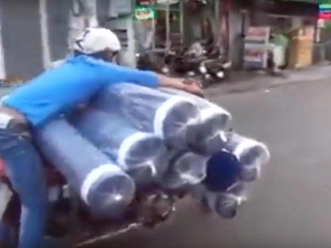 You Can't Stop Won't Stop This Guy From Delivering Carpet On His Moped