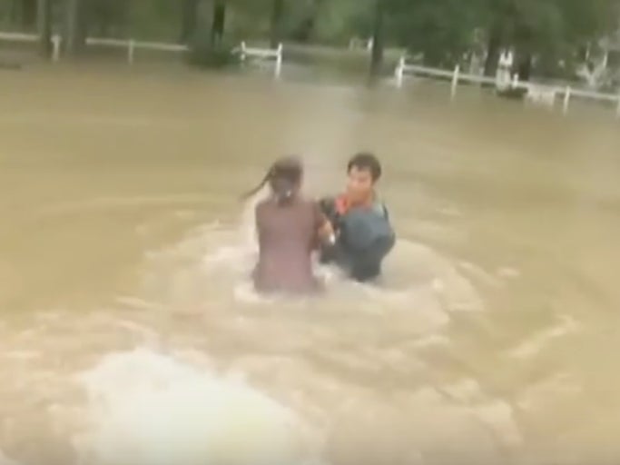 This Footage Of A Guy Saving A Woman And Her Dog From The Louisiana Floods Is INSANE
