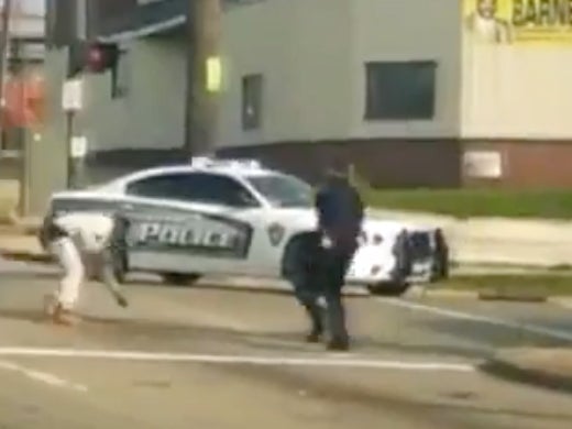 Man Wrestling With Police Officer Wriggles Free And Steals The Shit Out Of The Cop's Car