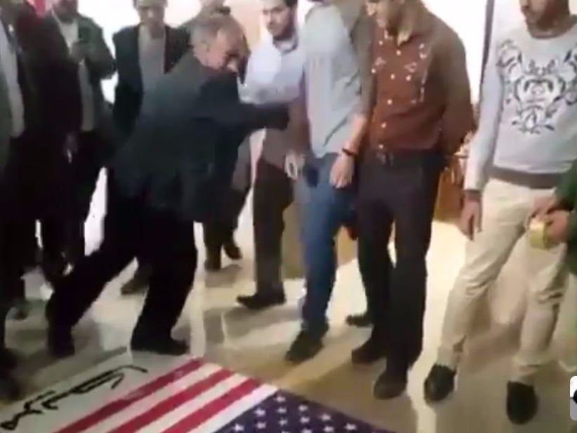 Shoutout To This Iranian Professor Shoving People Out Of The Way To Avoid Stomping On The American Flag