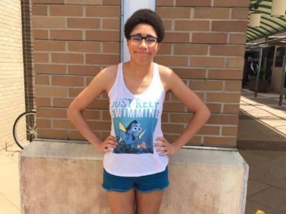 20-year-old Gets Kicked Out of a Mall for Wearing a Dory Tank Top and Cutoffs
