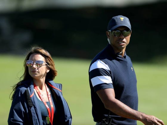 So Who Is Tiger's New Lady Friend That Was Following Him Around At The Presidents Cup?